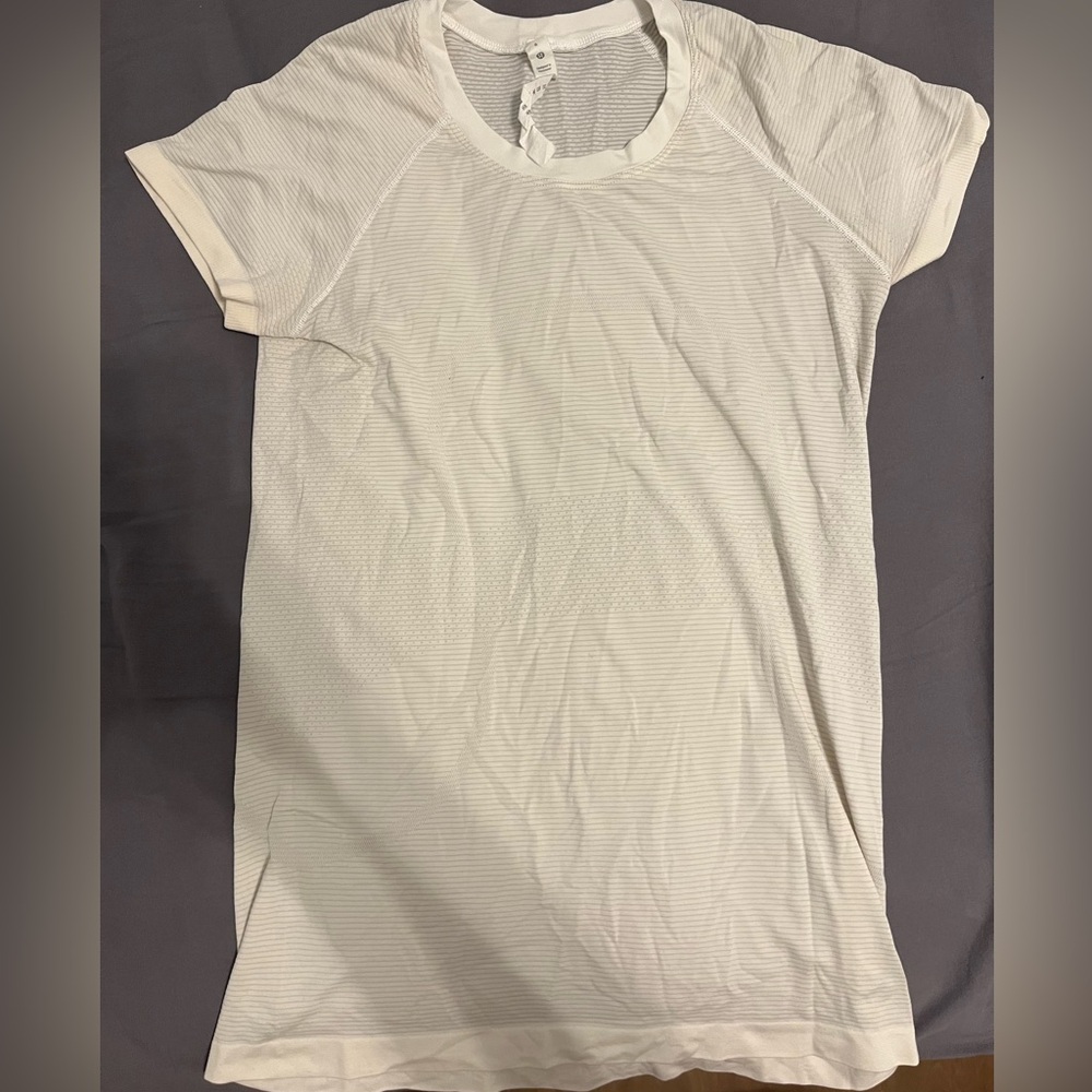 size 8, white lululemon swiftly tech, race length